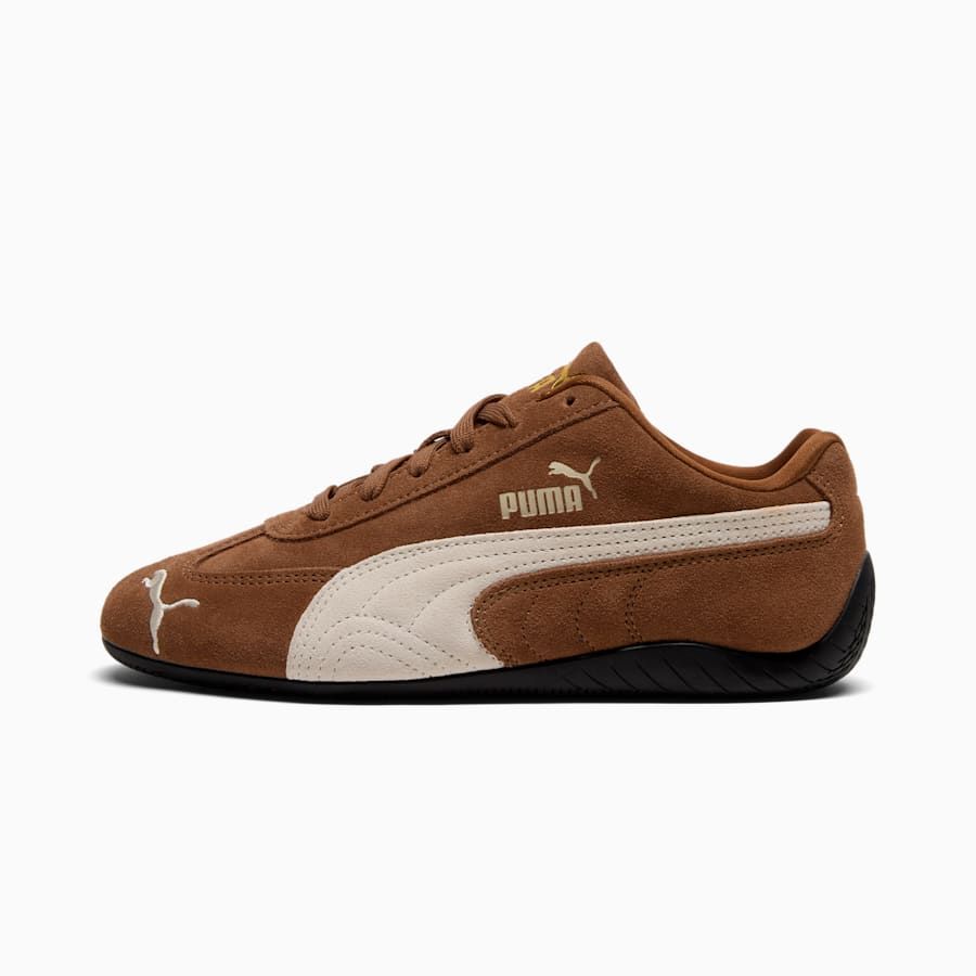 brown PUMA sneakers