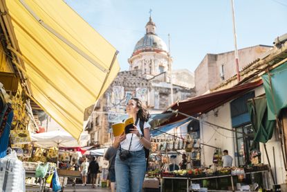 Tourist on a cheap, last-minute holiday in Palermo, Sicily, Italy