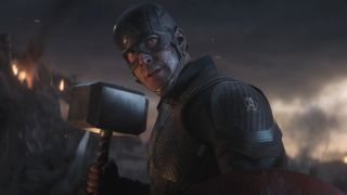 Chris Evans stands holding Mjolnir with determination in Avengers: Endgame.