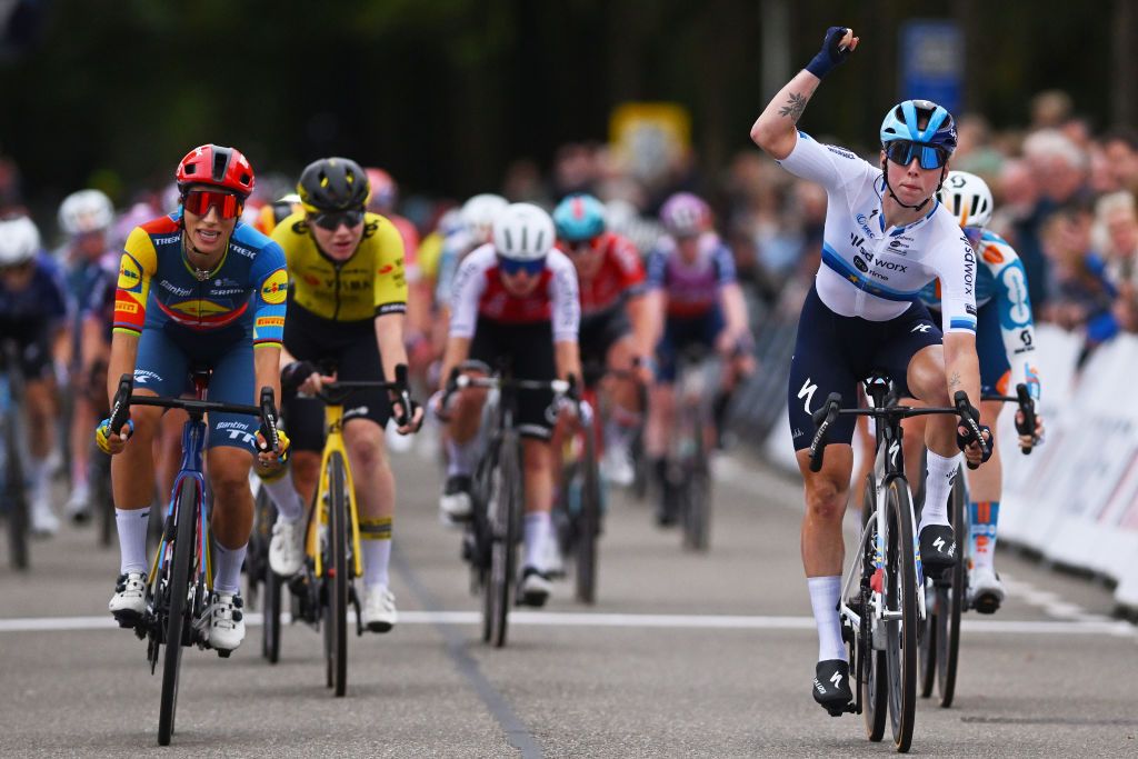 ASSEN NETHERLANDS OCTOBER 09 Lorena Wiebes of The Netherlands and Team SD Worx Protime R celebrates at finish line as stage winner ahead of Elisa Balsamo of Italy and Team Lidl Trek L during the 26th Simac Ladies Tour 2024 Stage 2 a 1548km stage from Coevorden to Assen on October 09 2024 in Assen Netherlands Photo by Luc ClaessenGetty Images