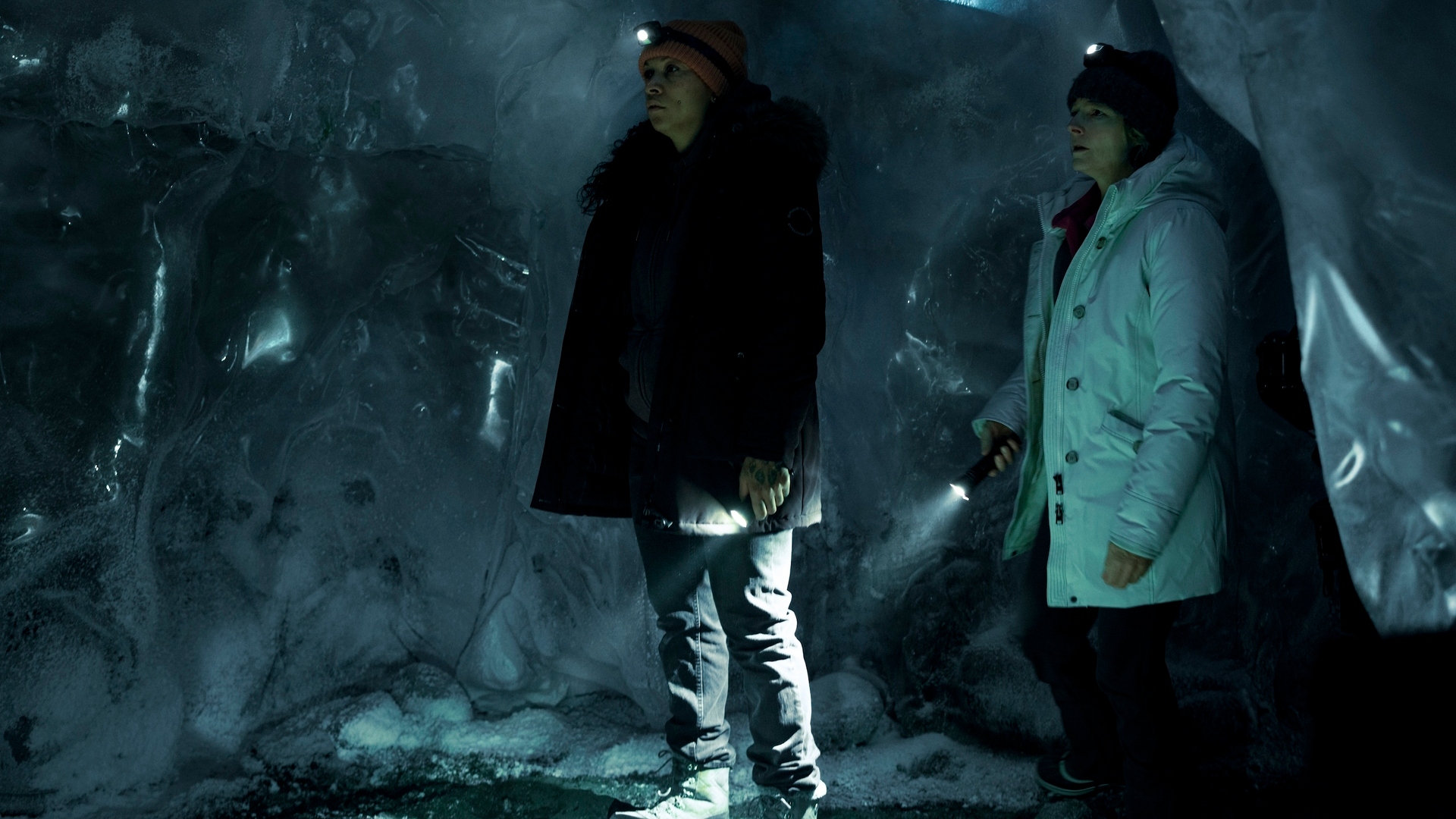 Danvers and Navarro stand in a cave in True Detective: Night Country