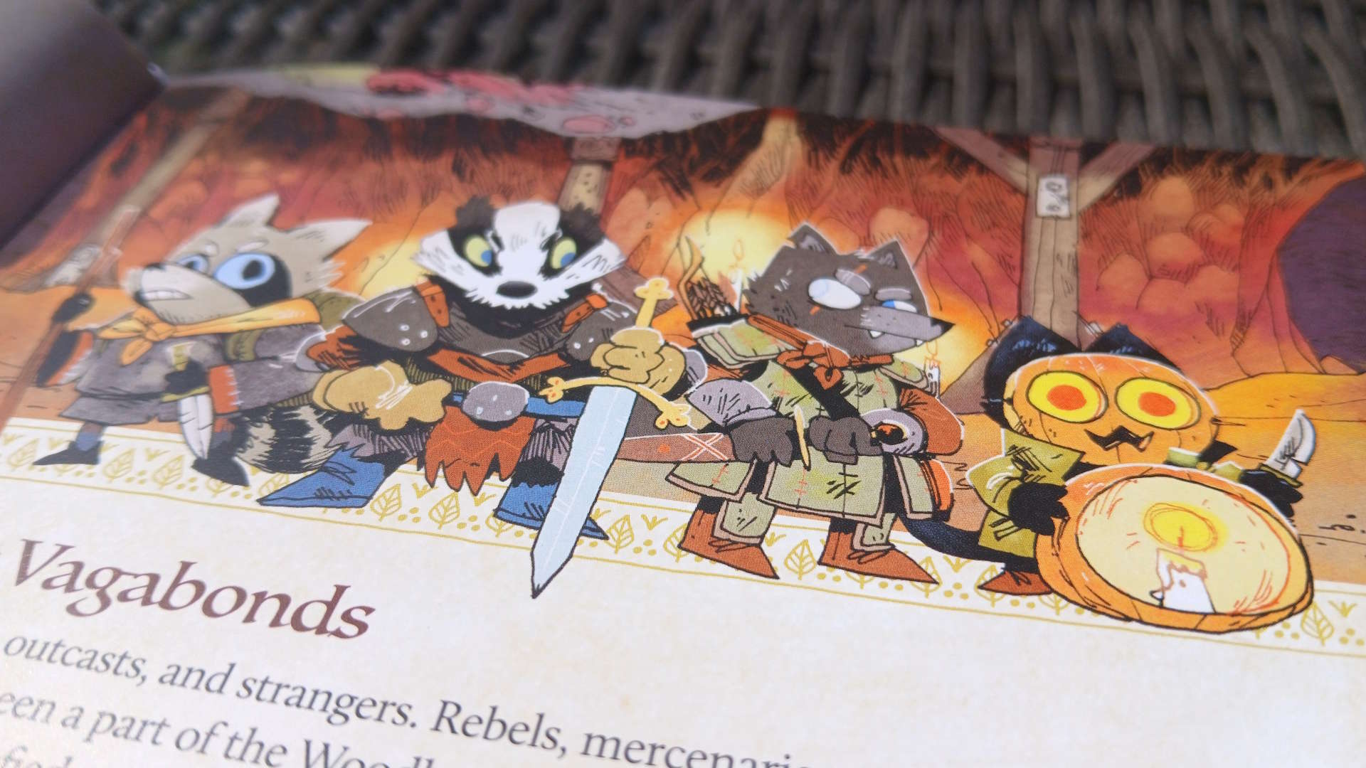 A lineup of animal Vagabonds with weapons and armor, against a cave backdrop