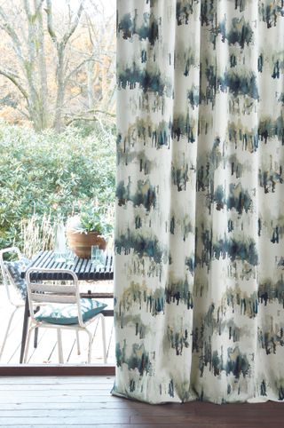 patio curtains with view of patio garden with tables and chairs print fabric