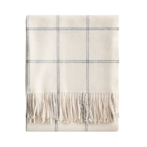 cream and blue throw blanket