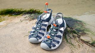 Keen Astoria West sandals on a beach