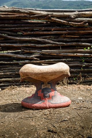 Backless clay stool in a yard in Ngobozana, Eastern Cape