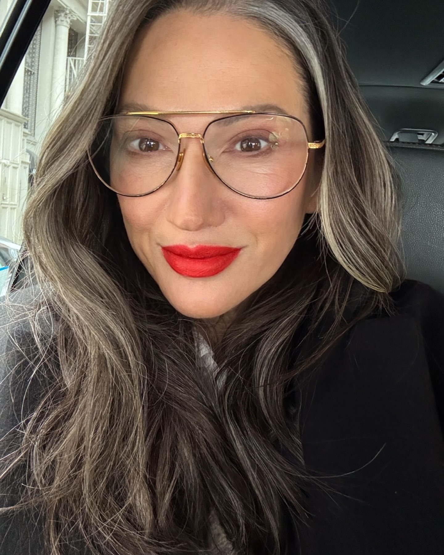 Jenna Lyons wearing red lipstick.