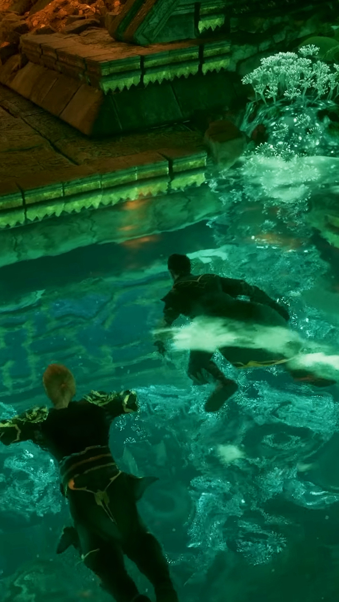Two Enshrouded characters swimming in a dungeon pool from the Wake of the Water update preview