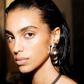 A model with super hydrated and nourished skin shows off the Satin Skin look perfectly