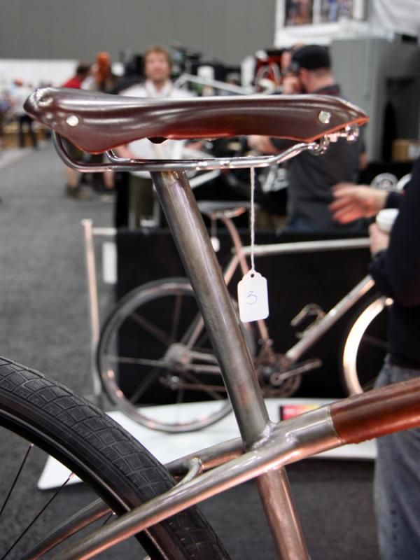 The integrated seatmast on Naked's city bike has no provisions for height adjustment.
