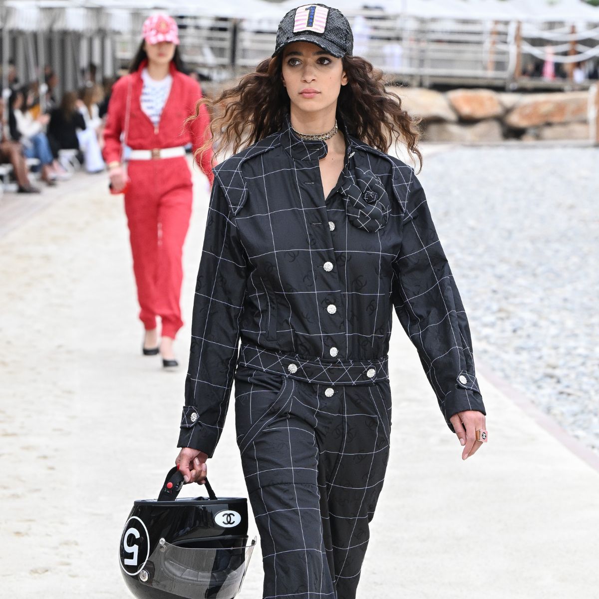 a model wearing formula 1-inspired clothes at the chanel 2023 cruise show