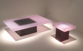 Two tables with light up pink table top