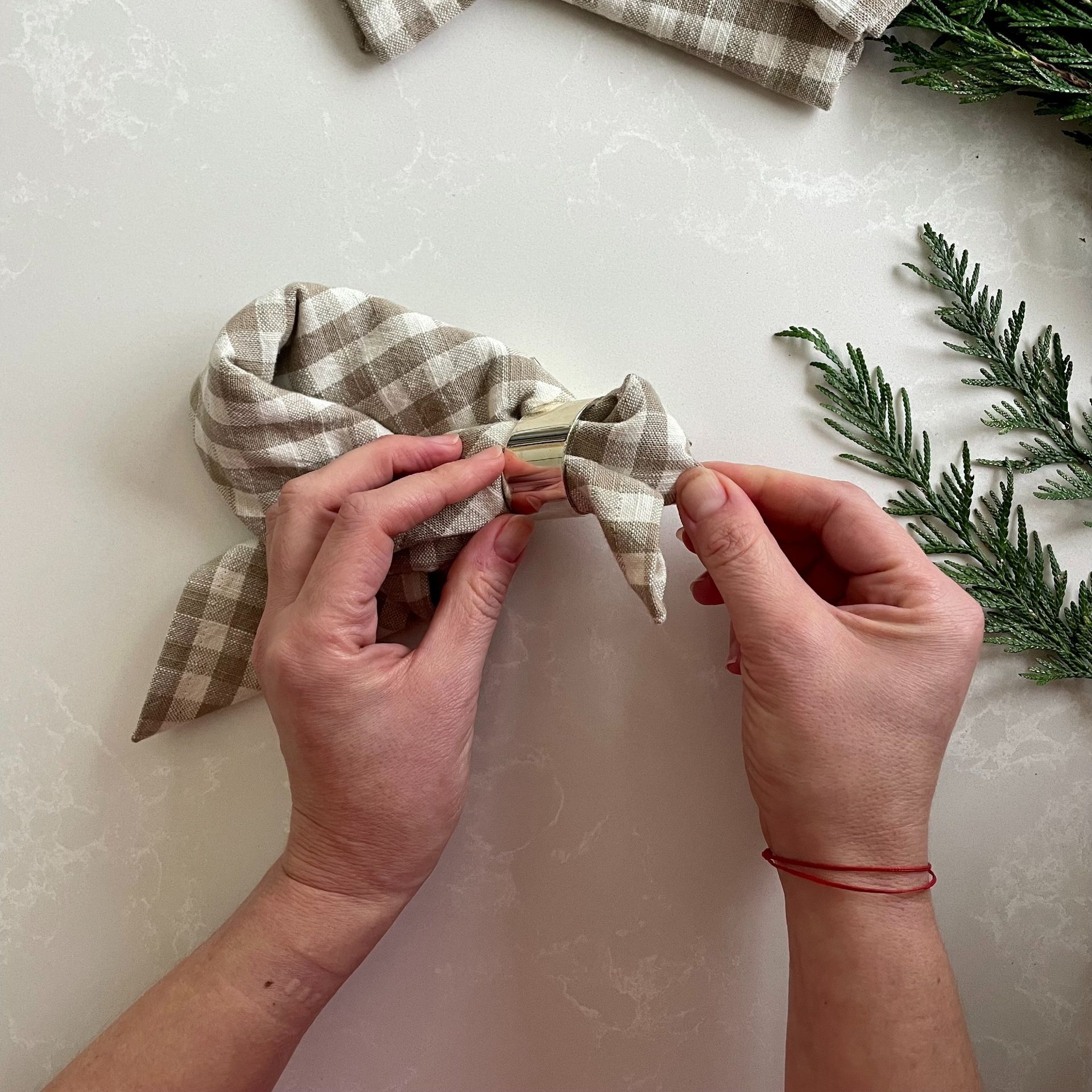 Folding a napkin into a bow