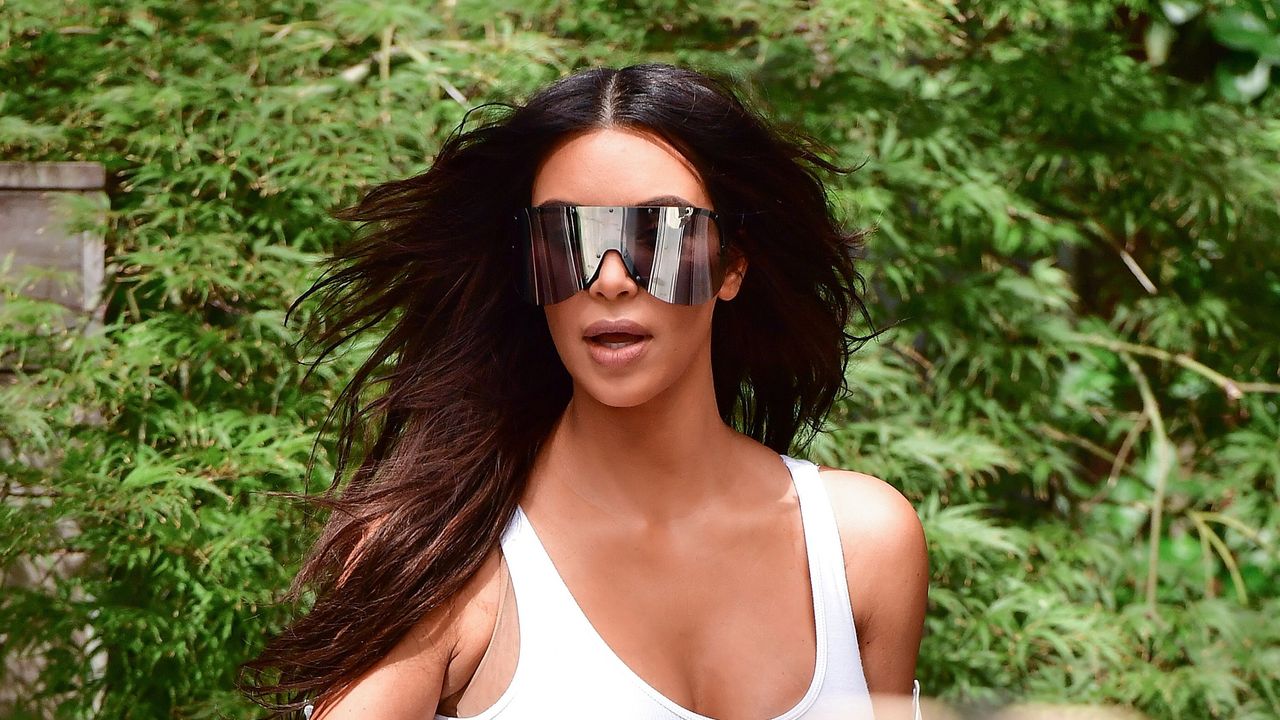 Kim Kardashian wearing big sunglasses.