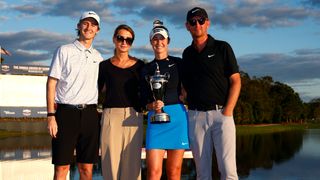 The Korda family pose with the Annika Driven by Gainbridge at Pelican trophy