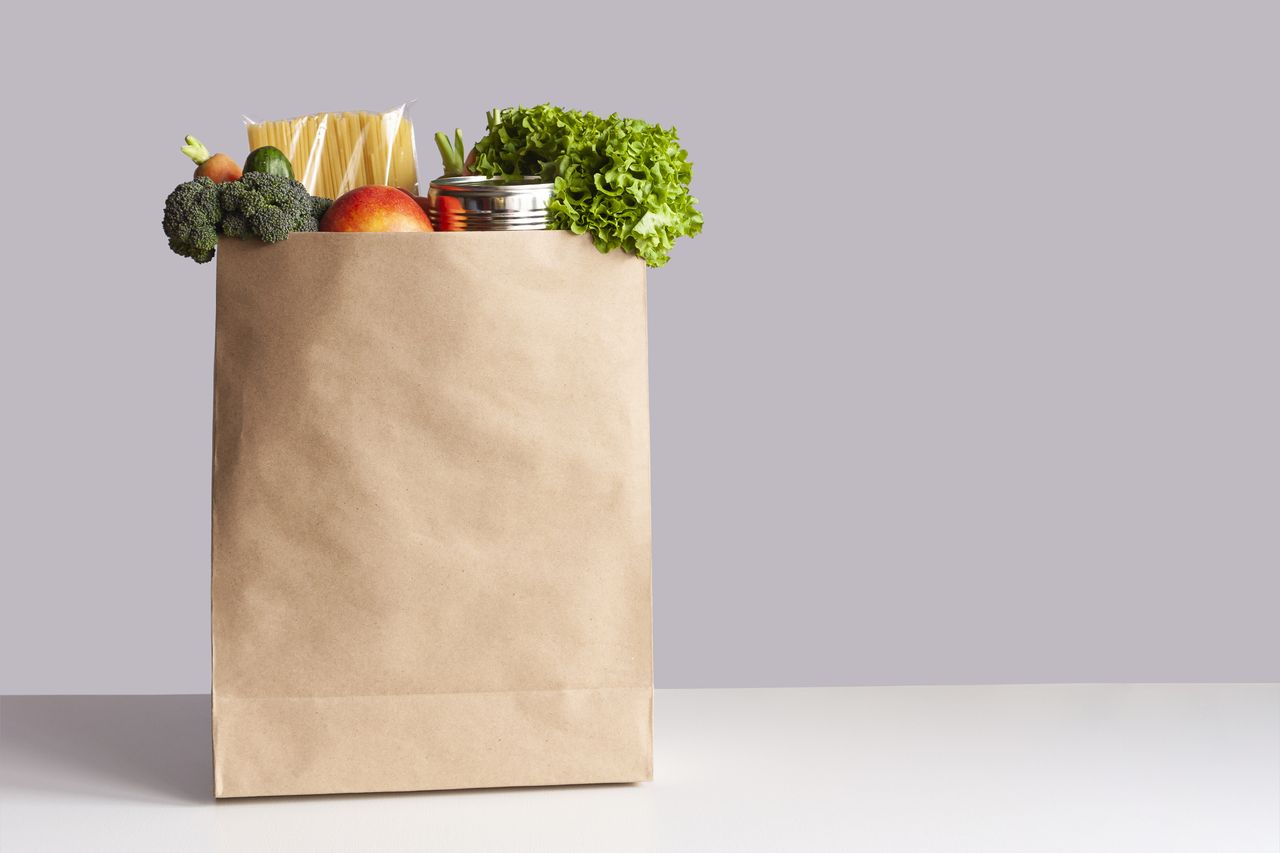 bag full of groceries sitting on a table