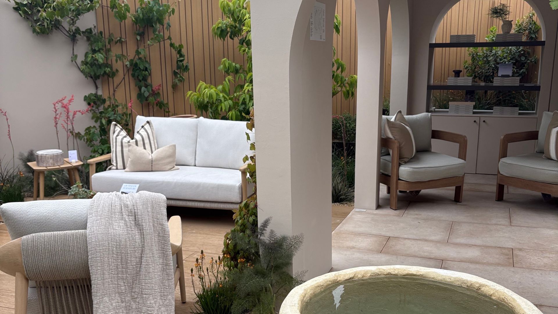 An outdoor space at the Chelsea Flower Show featuring Mediterranean garden design