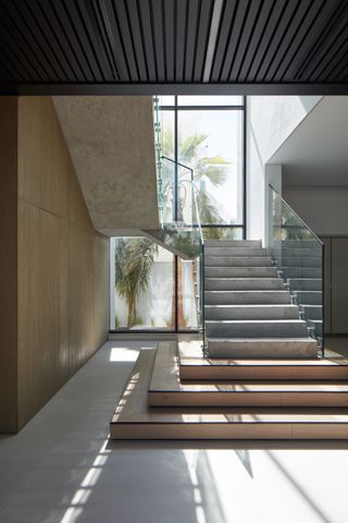 Minimalist staircase at modern house by Roar for Anas Bukhash