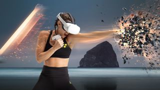 A woman wearing an Oculus headset and punching object in Supernatural workout image