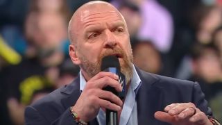 Triple H addresses the SmackDown crowd