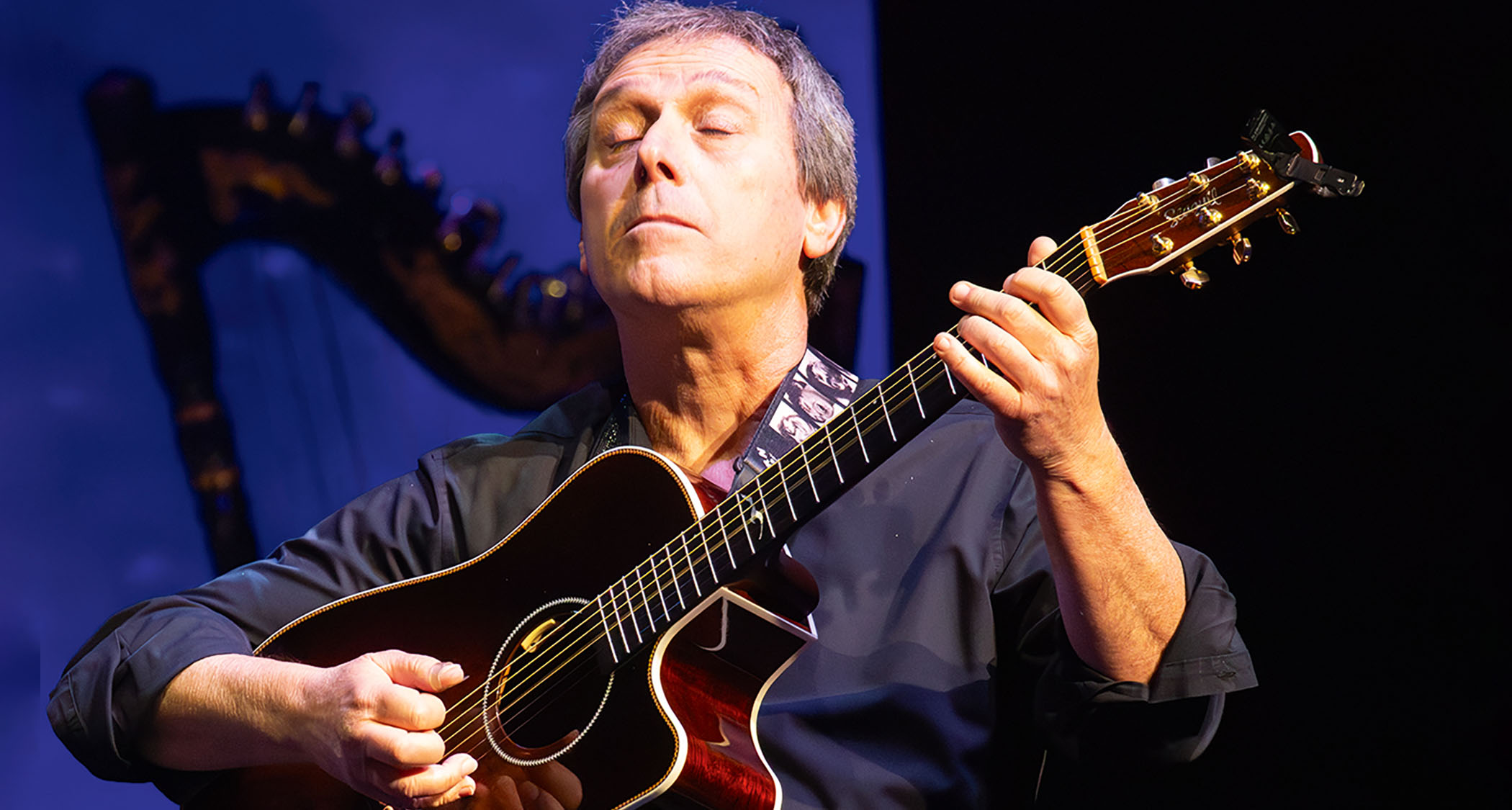 Peppino D&rsquo;Agostino plays a cutaway acoustic guitar
