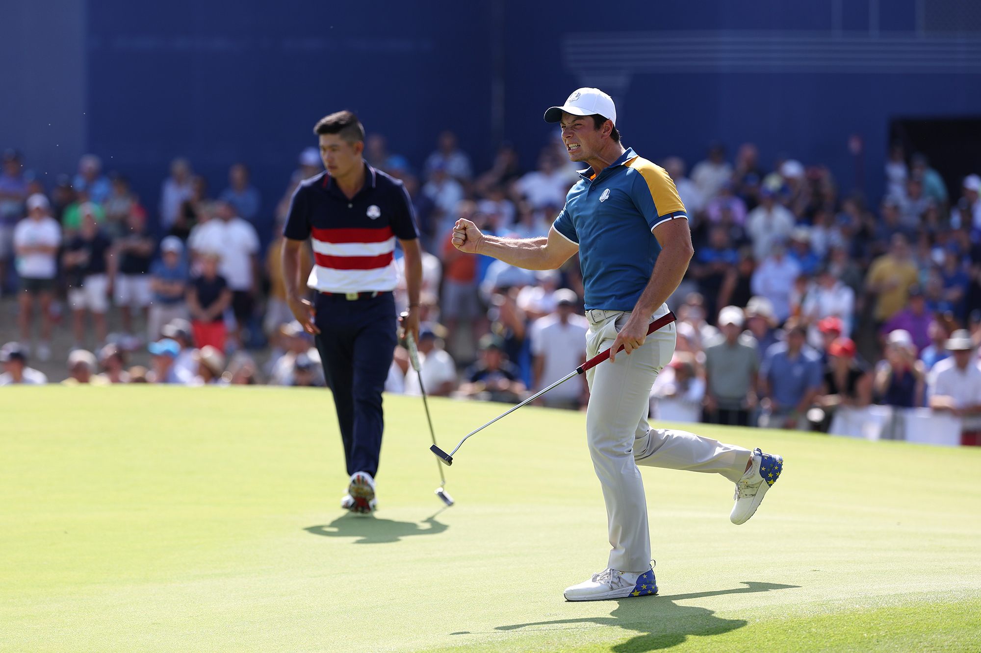 Viktor Hovland celebrating at the 2023 Ryder Cup after holing a putt against Collin Morikawa in the Sunday Singles