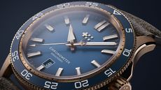 The Christopher Ward C60 Pro 300 Bronze with a blue dial