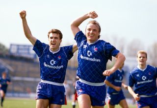 John Bumstead (right) and Tony Dorigo celebrate promotion with Chelsea in April 1989.