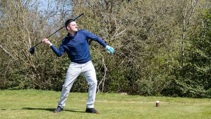 Golfer throws club in anger