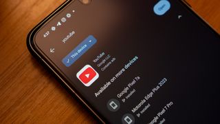 The YouTube app listing on the Google Play Store, running on a Google Pixel 8 Pro