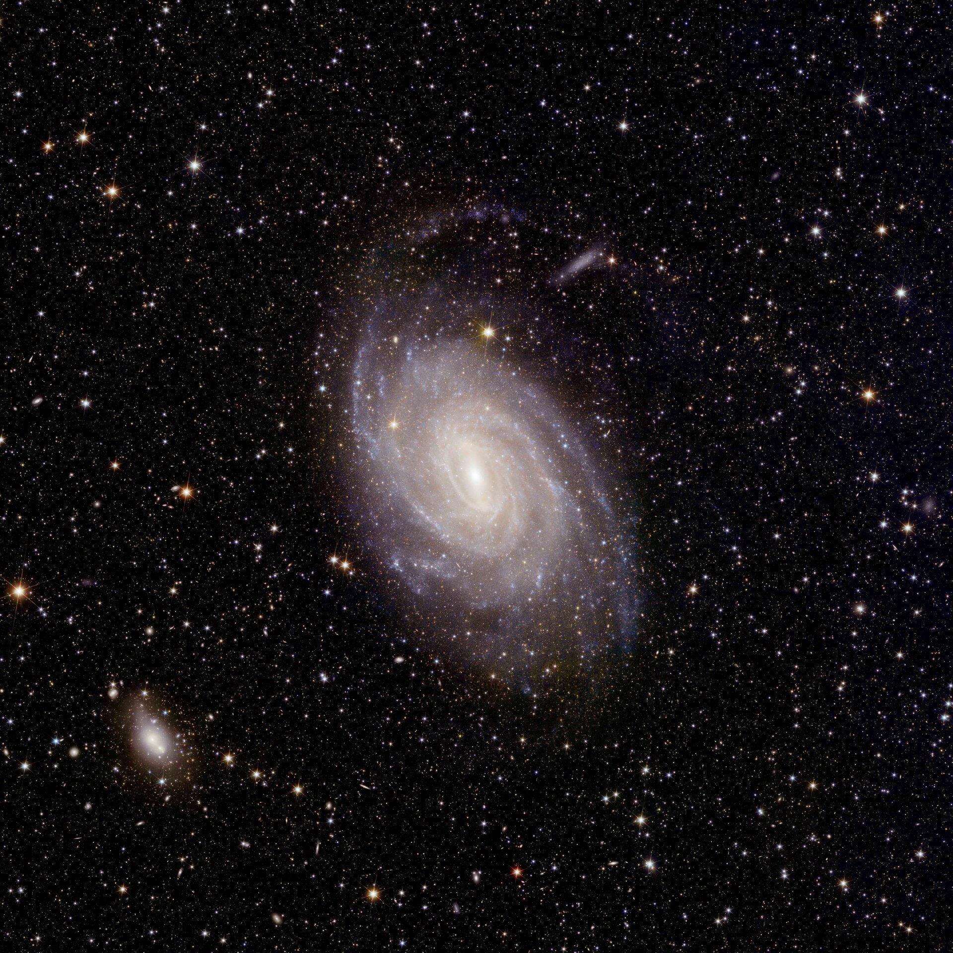 A perfect spiral galaxy in a field of stars