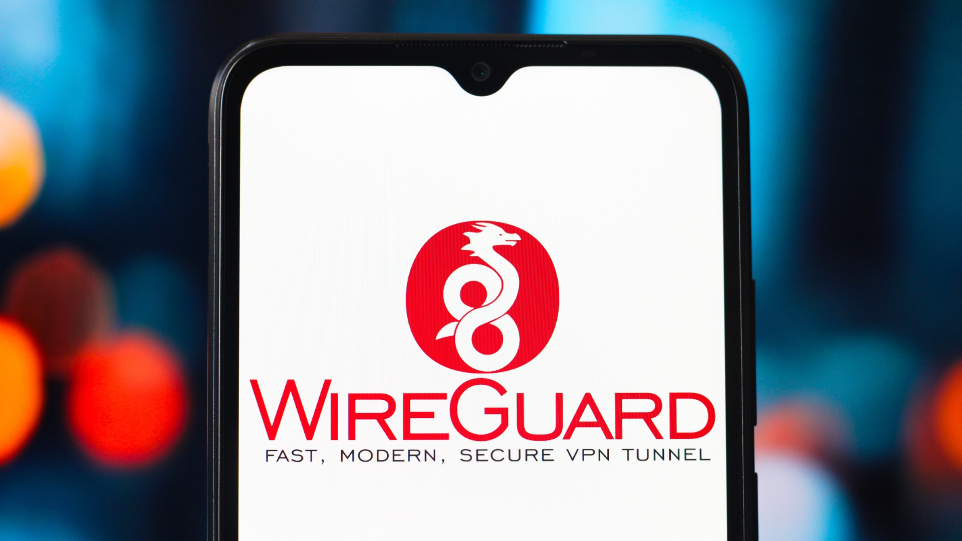 Photo illustration of the WireGuard logo displayed on a smartphone screen.