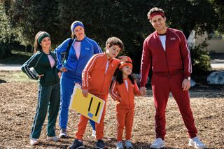 Jenna Ortega, Jennifer Garner, Julian Lerner, Everly Carganilla and Edgar Ramírez as the Torres family, all dressed in tracksuits and ready for a family fun day