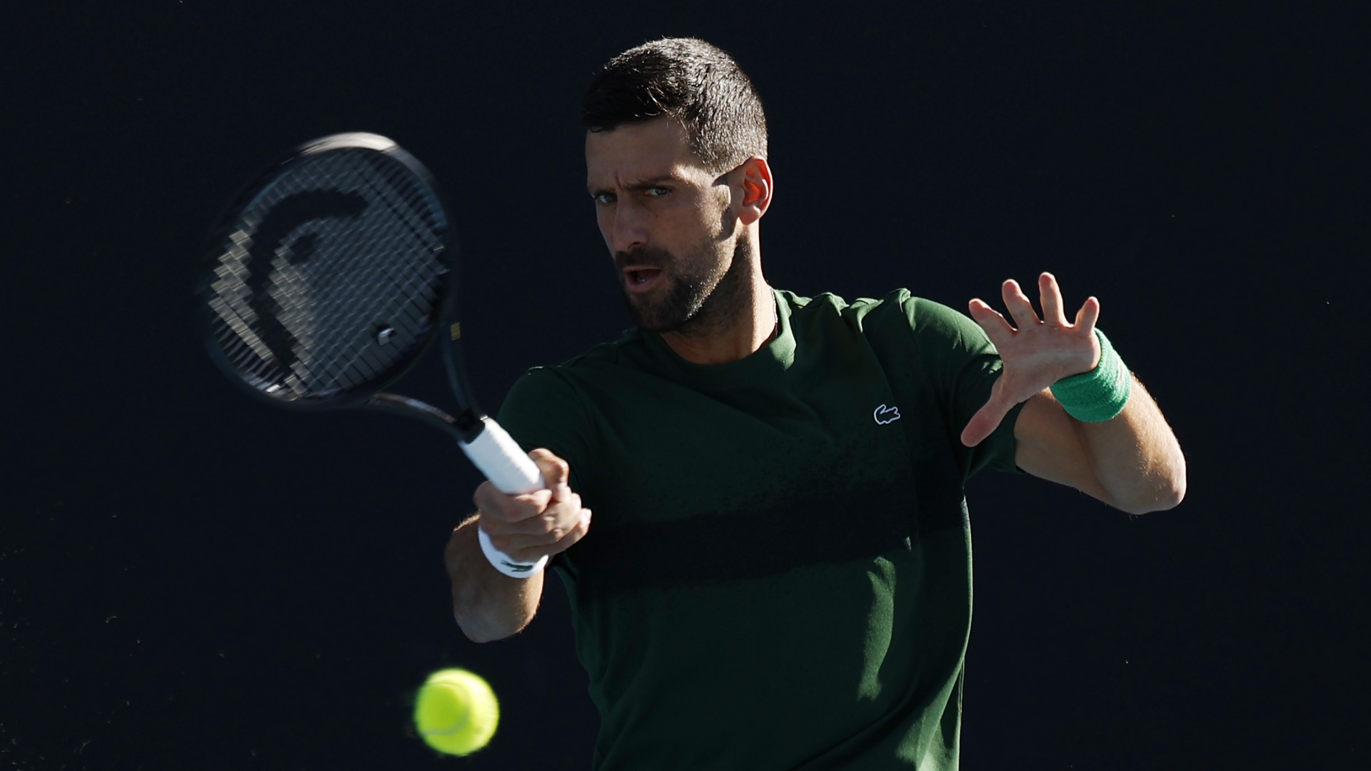 Novak Djokovic warming up at the 2026 Australian Open