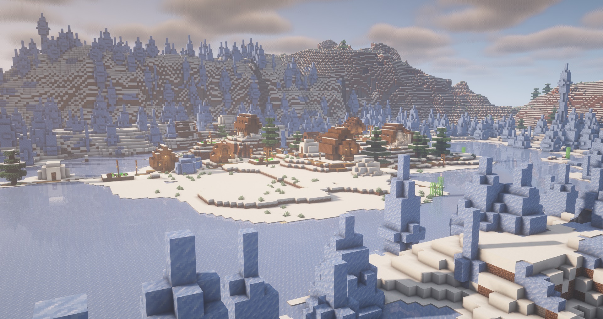 Minecraft - A village surrounded by ice spikes on a frozen lake