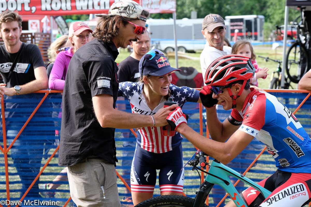 Kate Courtney congratulates her teammate Chris Blevins on his win today
