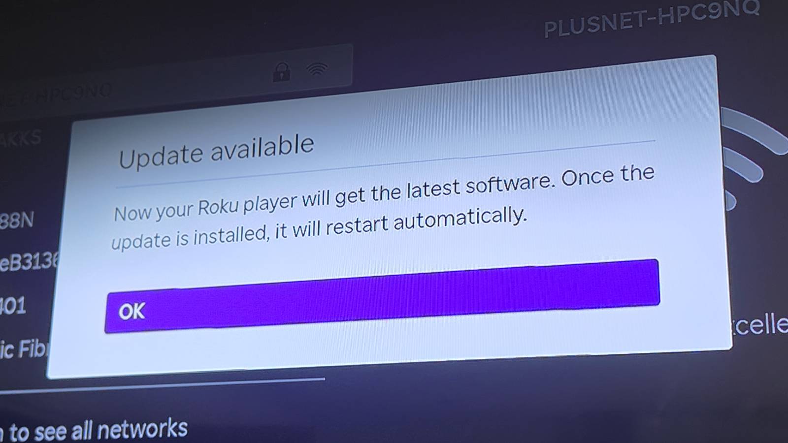 The Roku Streaming Stick's screen updating the Roku player.