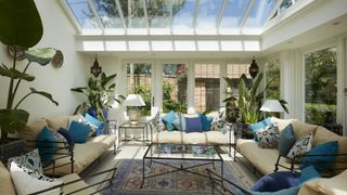 orangery ideas - modern orangery living room with glazed roof