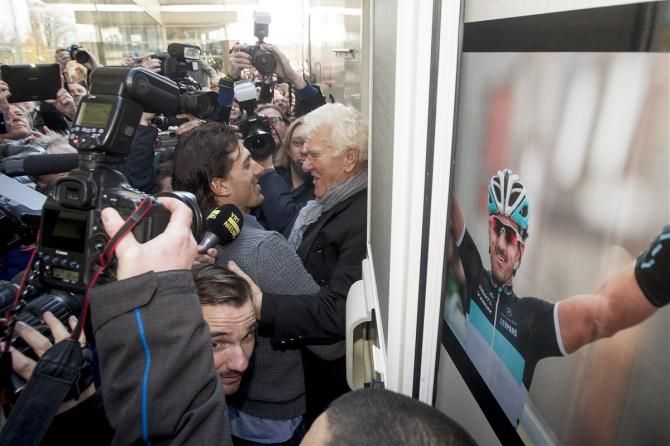 Fabian Cancellara is greeted by his Belgian fan club president Remi De Moor.