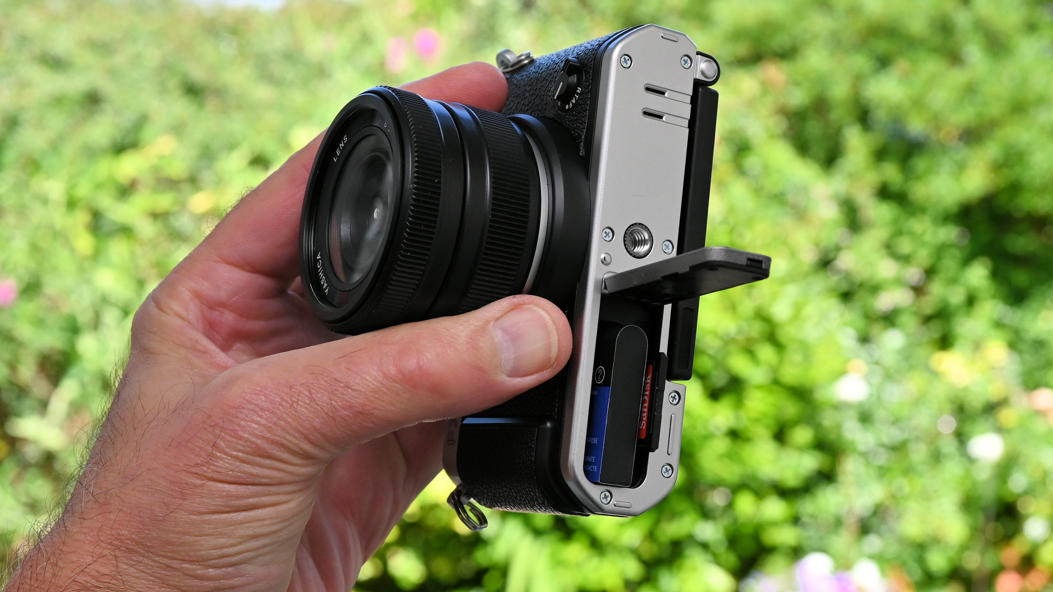 Yashica FX-D 300 product shot, camera held in hand