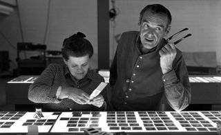 Ray and Charles Eames selecting slides