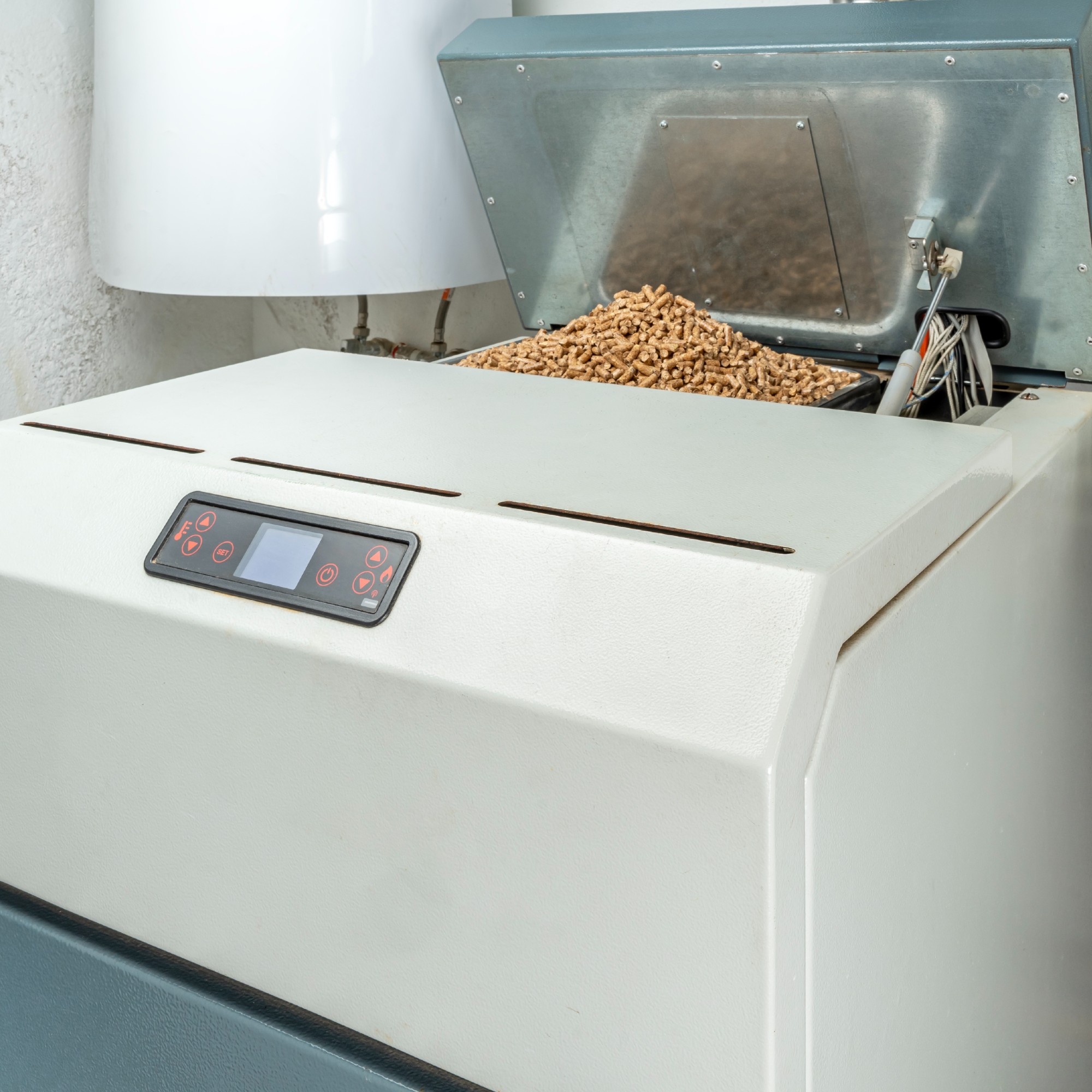 Biomass boiler with wood pellets on top