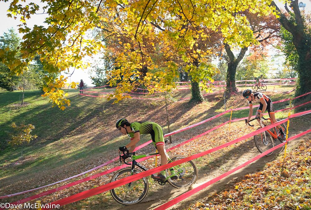 Curtis White (Cannondale) descending into the grassy bowl with Spencer Petrov behind him