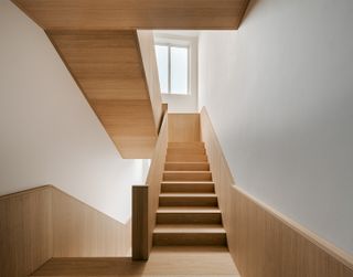 wooden staircase at Kolberger5 Euroboden by david chipperfield and StudioMarkRandel