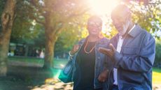 Couple walking in park