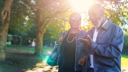 Couple walking in park