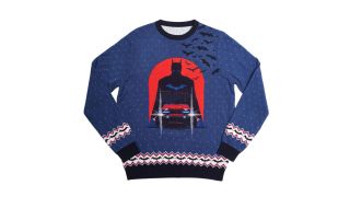 best Christmas jumpers illustrated with a jumper featuring Batman and a festive design