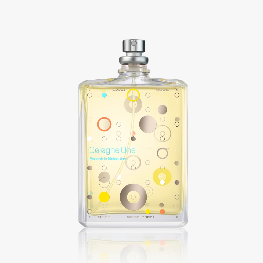 A product shot of the Escentric Molecules Cologne One, on a grey background