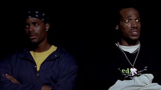 Shawn and Marlon Wayans looking judgmentally in the dark in Scary Movie 2