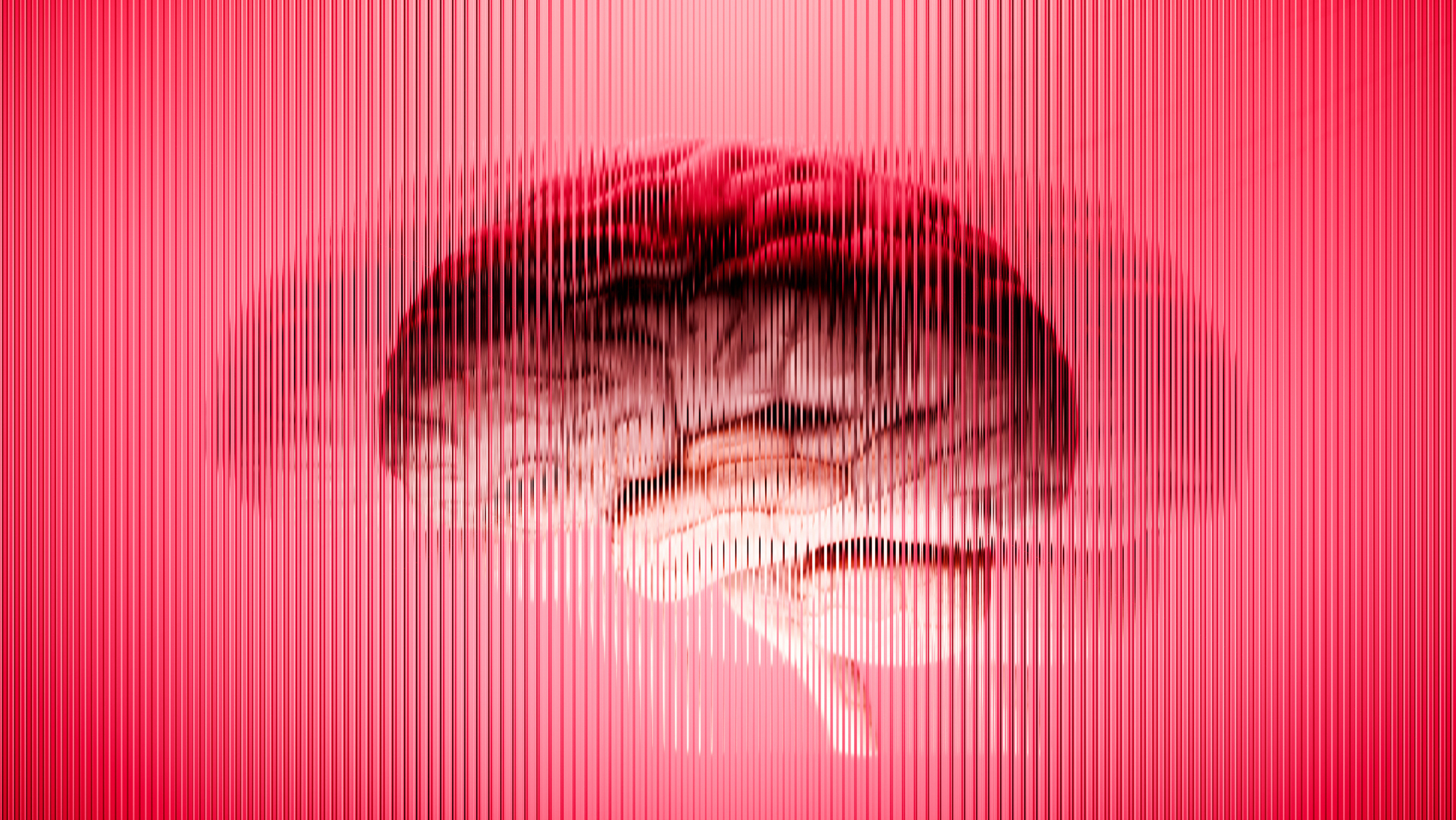 A close up of a brain against a pink patterned background
